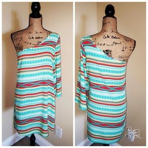 One shoulder multi color dress.